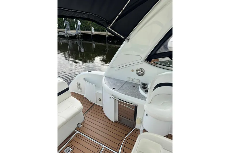 Slide: The Image of 2008 Formula 37 Performance Cruiser cockpit with seating and wood-style flooring. - 42