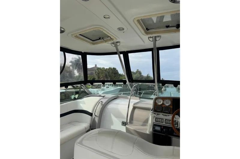 Slide: The Image of Interior view of a 2008 Formula 37 Performance Cruiser, showcasing helm and seating area. - 45