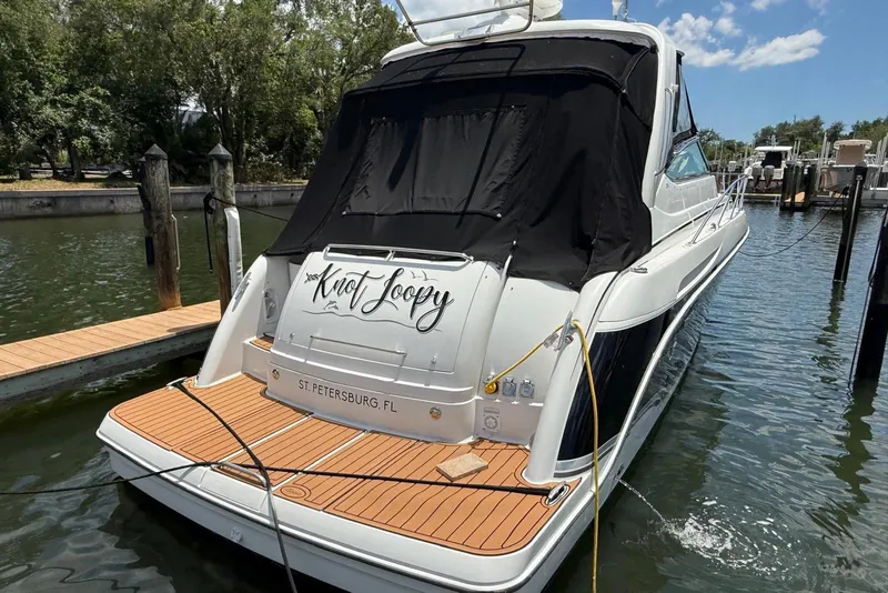 Slide: The Image of 2008 Formula 37 Performance Cruiser docked in St. Petersburg, FL, with custom name "Knot Loopy." - 6