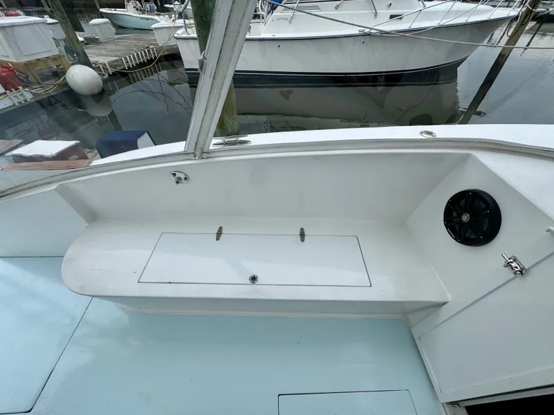 Slide: The Image of The image shows a boat's cockpit with a bench seat and a speaker. - 20