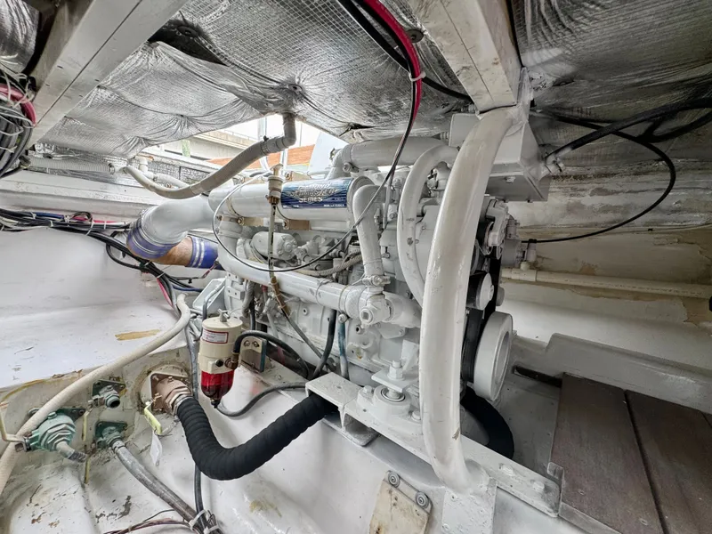Slide: The Image of A clean engine room with a well-maintained engine and insulation. - 30