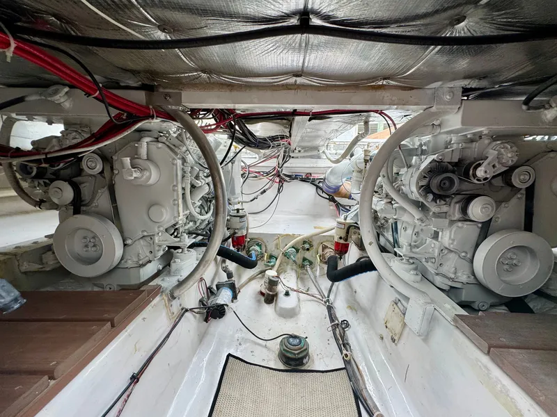 Slide: The Image of Engine room of a 1992 L&H 33 boat with two large engines. - 31