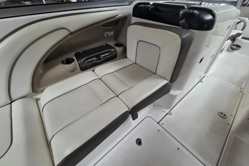 Slide: The Image of Interior seating of 2013 Yamaha 242 Limited S boat, featuring beige and brown upholstery. - 17