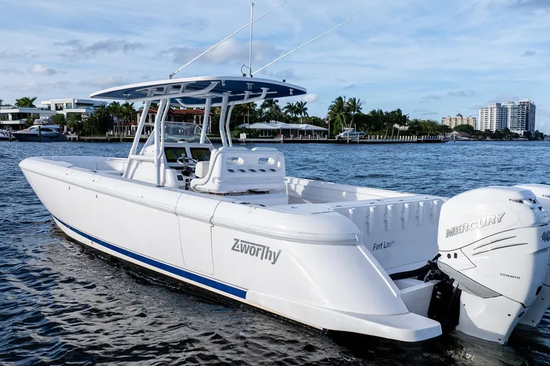 Slide: The Image of 2021 Intrepid boat with Mercury engines on a scenic waterway. - 6
