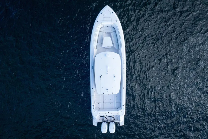 Slide: The Image of Aerial view of 2021 Intrepid boat on dark blue water. - 9