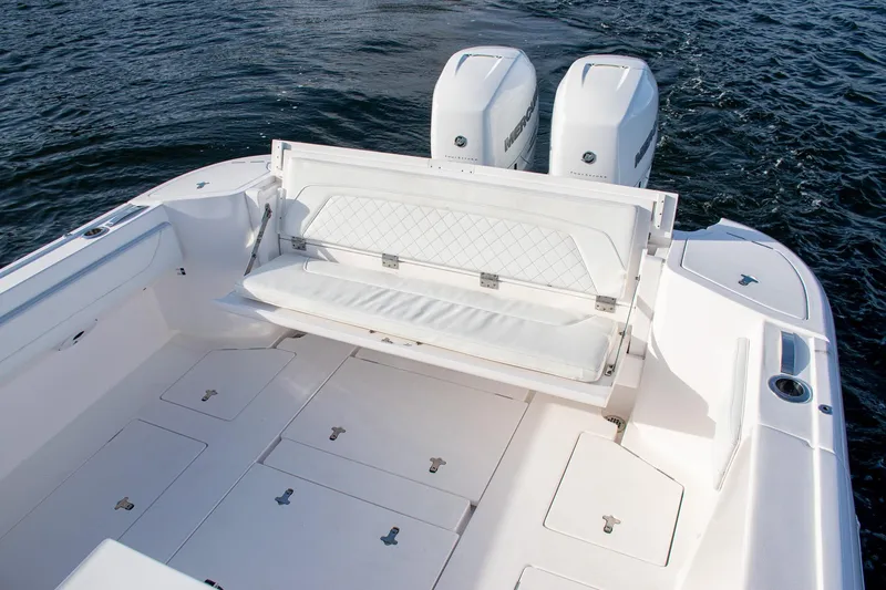 Slide: The Image of 2021 Intrepid boat with dual Mercury engines and spacious seating on open water. - 17