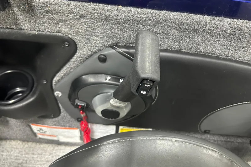 Slide: The Image of 2024 Tracker Targa V-18 Combo boat throttle control with trim switch and safety lanyard. - 17