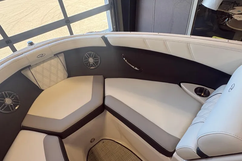 Slide: The Image of Luxurious interior of 2027 Regal 2000 ES boat with plush seating and modern design. - 18