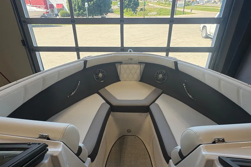 Slide: The Image of Interior of 2027 Regal 2000 ES boat with sleek seating and modern design. - 15