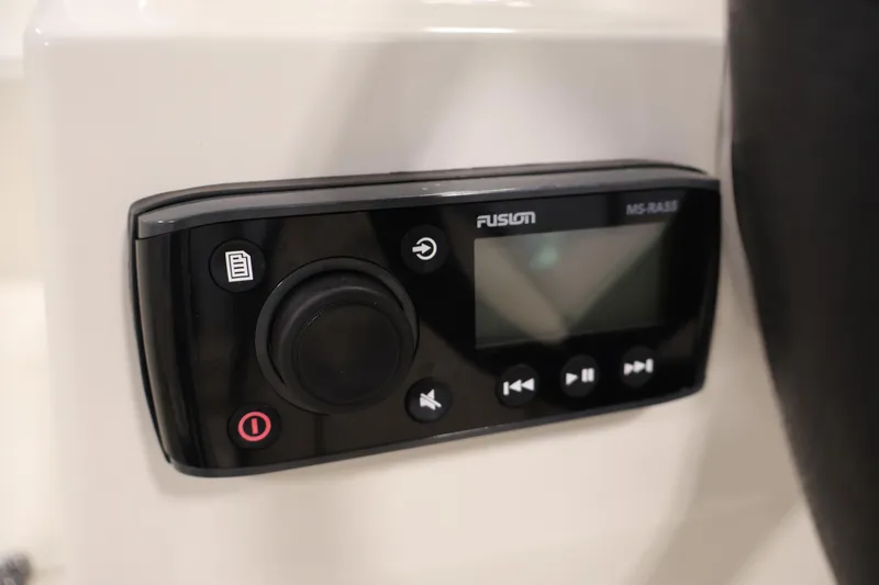 Slide: The Image of Fusion MS-RA55 stereo system on 2021 Stingray 172 SC boat dashboard. - 22