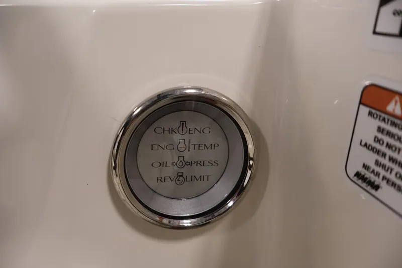 Slide: The Image of Gauge panel on 2021 Stingray 172 SC boat, displaying engine indicators and warnings. - 24