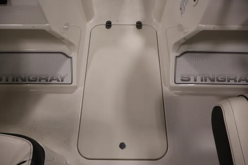 Slide: The Image of 2021 Stingray 172 SC boat interior with branded flooring and seating. - 30