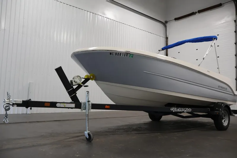 Slide: The Image of 2021 Stingray 172 SC boat on trailer in indoor storage facility. - 43