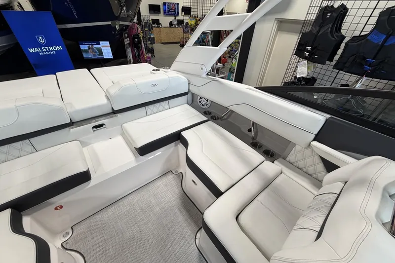 Slide: The Image of Luxurious interior of 2027 Regal LS2 boat with white seating and modern design. - 7