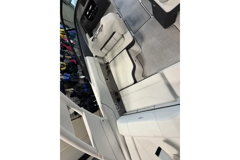 Slide: The Image of Luxurious interior of a 2027 Regal LS2 boat with white seating and modern design. - 20