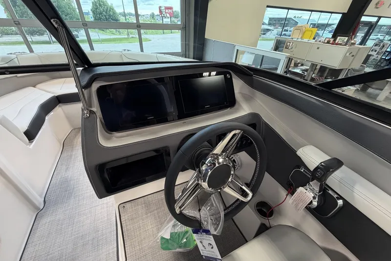 Slide: The Image of 2027 Regal LS2 boat interior with modern dashboard and steering wheel. - 5