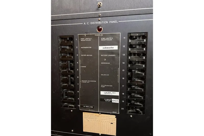 Slide: The Image of Electrical distribution panel on a 1987 Hatteras 40 Double Cabin boat. - 38
