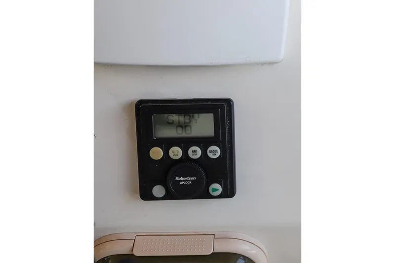 Slide: The Image of Autopilot control panel on a 1987 Hatteras 40 Double Cabin yacht. - 61