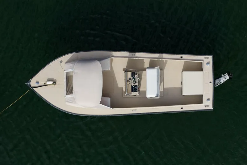 Slide: The Image of Overhead view of 1989 Ellis 24 Open boat on water. - 22