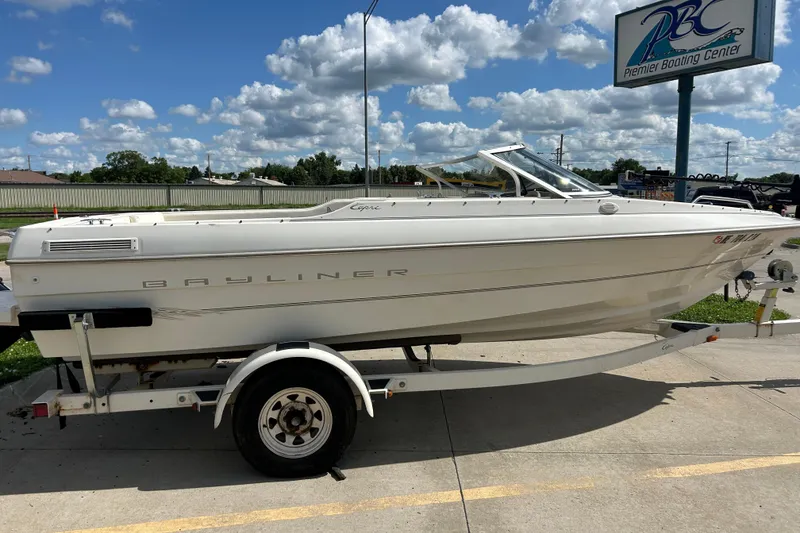 The Image of 1999 Bayliner 1954 Capri boat on trailer at Premier Boating Center. - 1