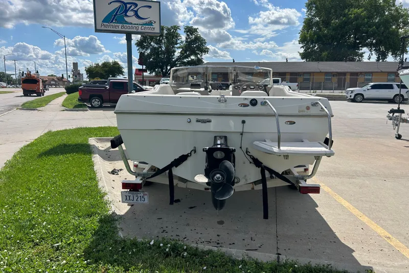 Slide: The Image of 1999 Bayliner 1954 Capri boat at Premier Boating Center parking lot. - 3