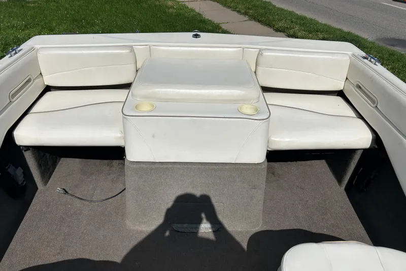 Slide: The Image of Interior seating of a 1999 Bayliner 1954 Capri boat with white upholstery. - 22
