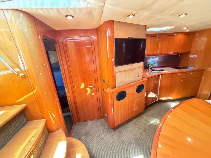 Slide: The Image of Interior of the 2008 Sunseeker Portofino 53 with wood finish and modern kitchen. - 17