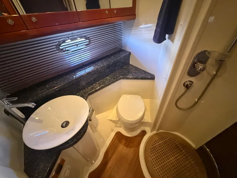 Slide: The Image of The image shows an elegant bathroom on a 2008 Sunseeker Portofino 53 yacht. - 25