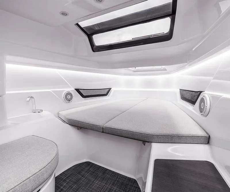Slide: The Image of Interior of a modern cabin with gray cushions and skylights. - 10