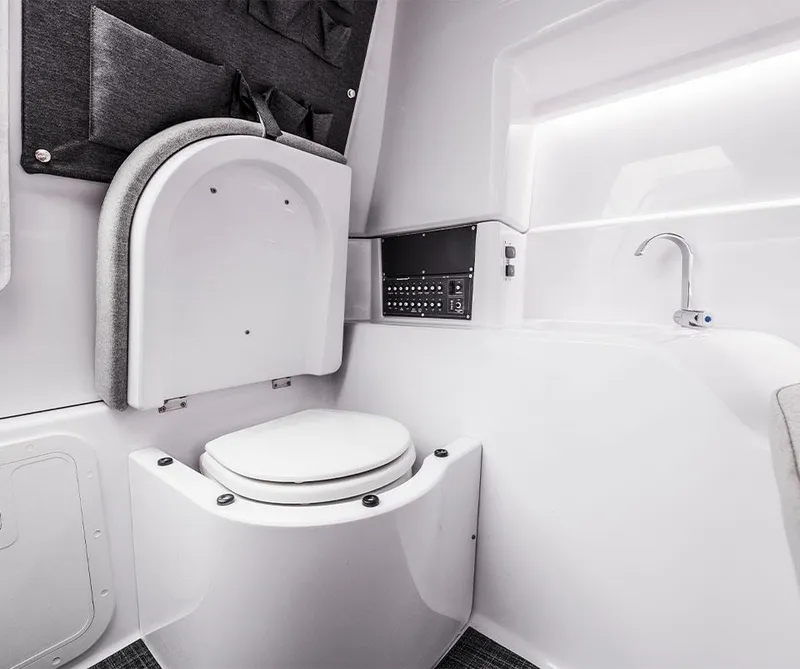 Slide: The Image of Interior of a modern boat cabin with a toilet and sink. - 8