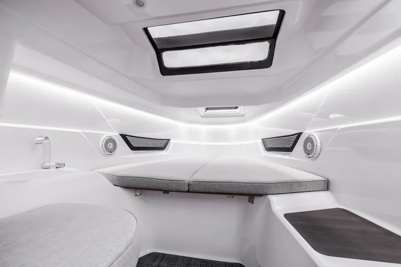 Slide: The Image of Interior of a modern cabin with cushioned seating and skylights. - 9
