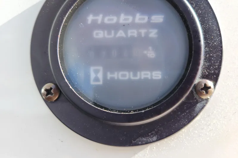 Slide: The Image of Close-up of a Hobbs Quartz hour meter on a 2005 Cobalt 255 boat. - 20