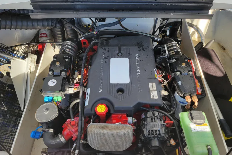 Slide: The Image of Engine compartment of a 2005 Cobalt 255 boat, featuring a Volvo Penta engine. - 19