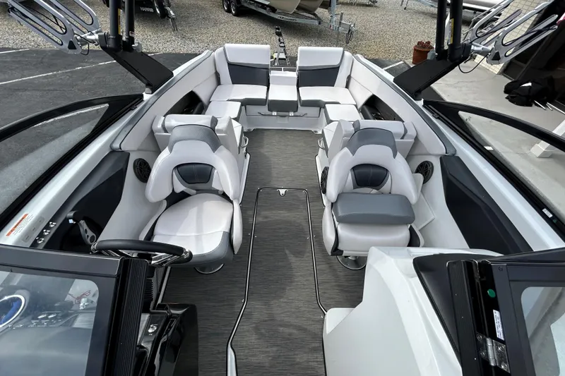 Slide: The Image of 2023 Scarab 255 Wake ID boat interior with modern seating and sleek design. - 18