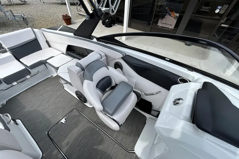 Slide: The Image of 2023 Scarab 255 Wake ID boat interior with modern seating and sleek design. - 20