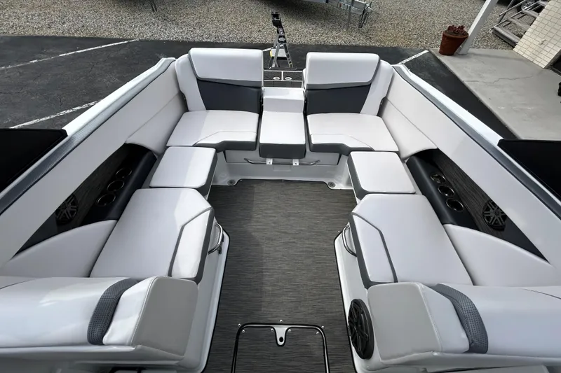 Slide: The Image of 2023 Scarab 255 Wake ID boat interior with spacious seating and modern design. - 21