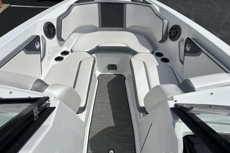Slide: The Image of 2023 Scarab 255 Wake ID boat interior with gray seating and cup holders. - 33