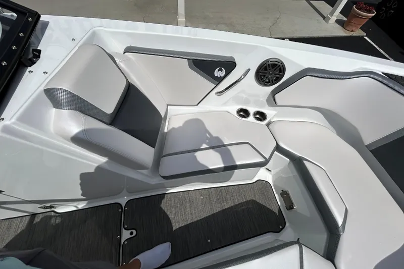 Slide: The Image of Interior seating of 2023 Scarab 255 Wake ID boat with modern design and cup holders. - 35
