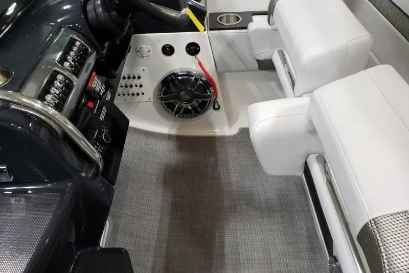 Slide: The Image of Interior of 2021 Formula 350 Sun Sport boat with white seating and control panel. - 13