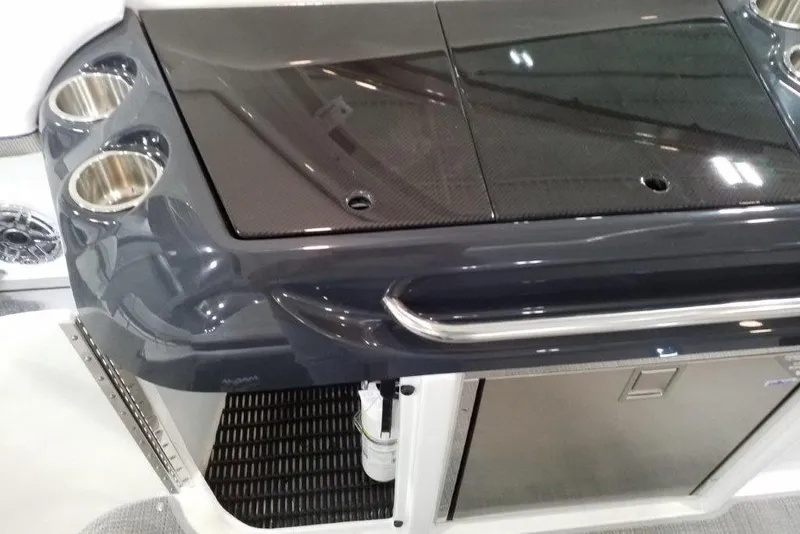 Slide: The Image of 2021 Formula 350 Sun Sport boat interior with sleek countertop and cup holders. - 17