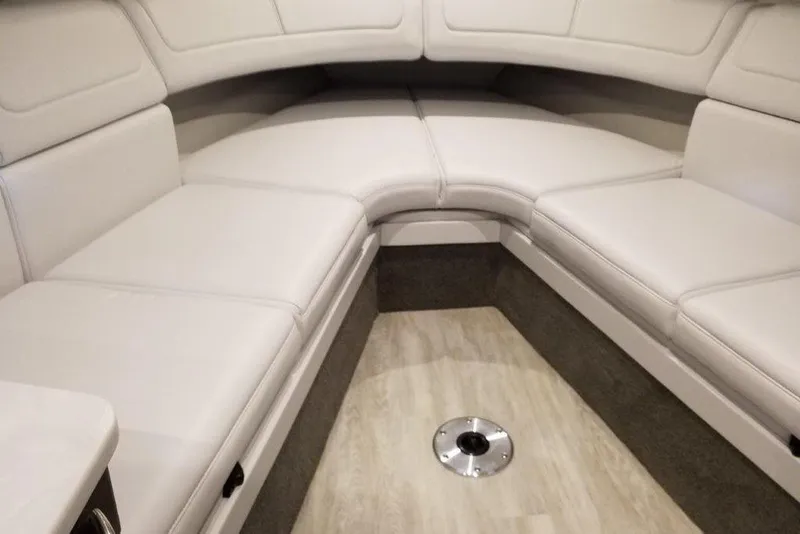 Slide: The Image of Interior seating of 2021 Formula 350 Sun Sport boat, featuring plush white upholstery. - 23