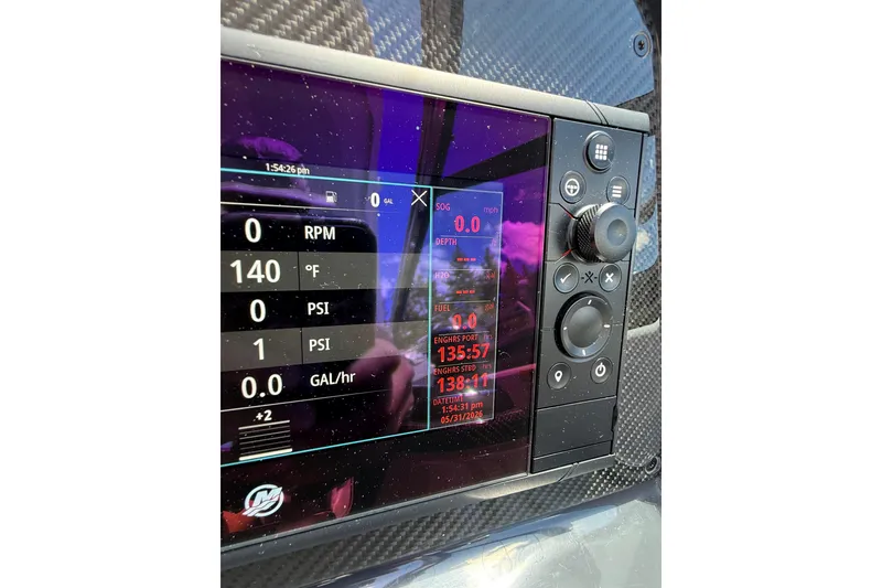 Slide: The Image of Dashboard display of a 2021 Formula 350 Sun Sport boat showing RPM, temperature, and fuel data. - 30
