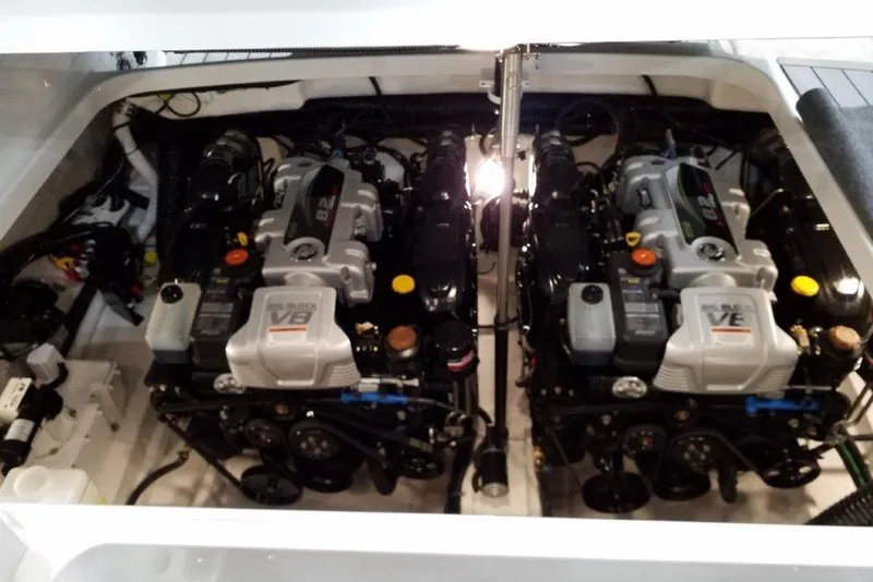 Slide: The Image of Engine compartment of a 2021 Formula 350 Sun Sport boat, featuring dual V8 engines. - 31