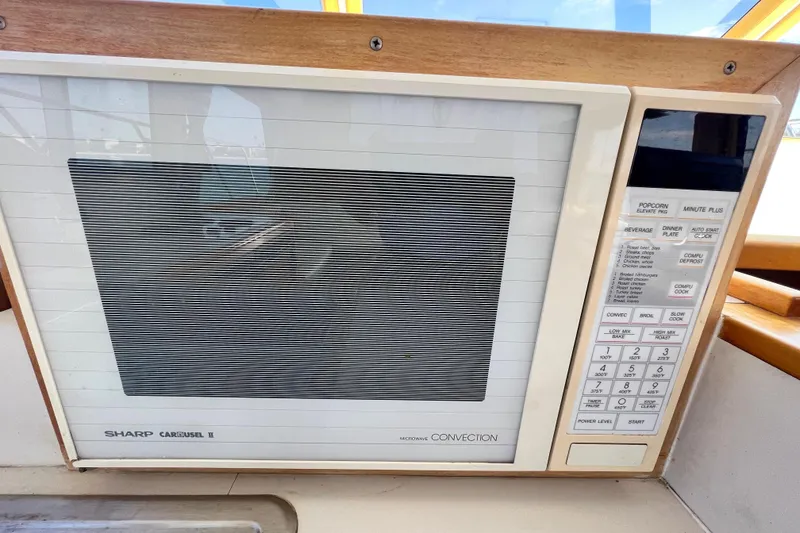 Slide: The Image of Sharp Carousel II microwave with convection settings on a Navigator 4300, 1994 model. - 30
