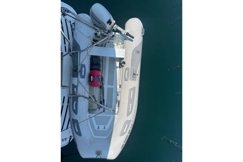 Slide: The Image of Overhead view of a 1987 President 37 boat with an outboard motor. - 74