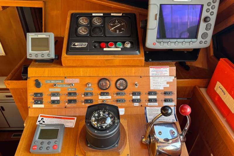 Slide: The Image of Control panel of a 1987 President 37 boat with navigation instruments. - 19