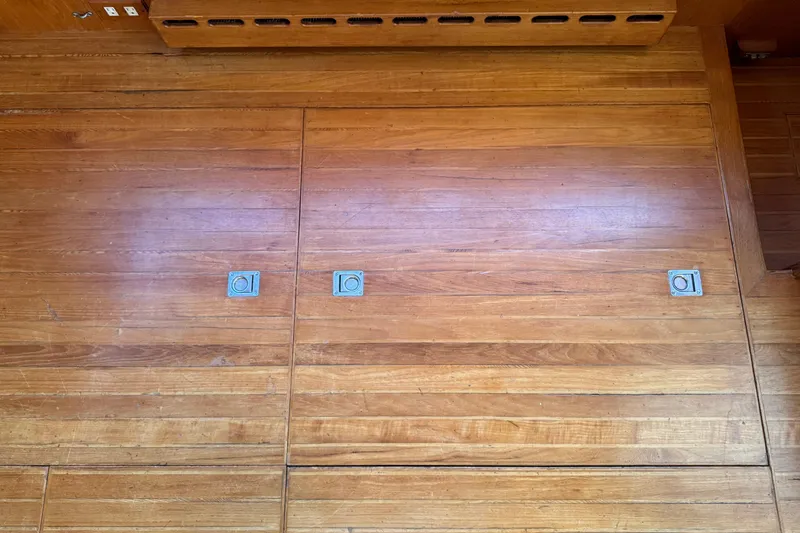 Slide: The Image of Wooden floor with metal fixtures, President 37 model, 1987 design. - 23