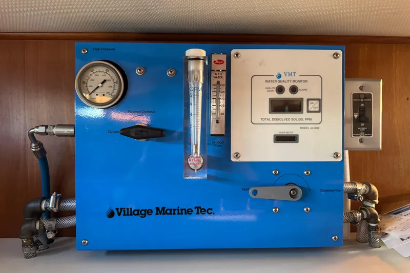 Slide: The Image of Blue Village Marine Tec water quality monitor on a President 37, 1987 model boat. - 32