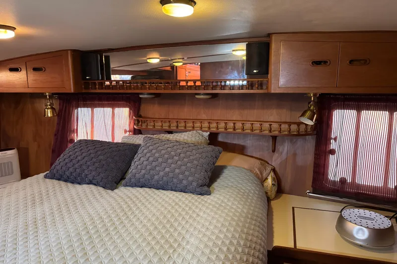 Slide: The Image of Cozy bedroom interior in 1987 President 37 model with wooden cabinets and soft lighting. - 49