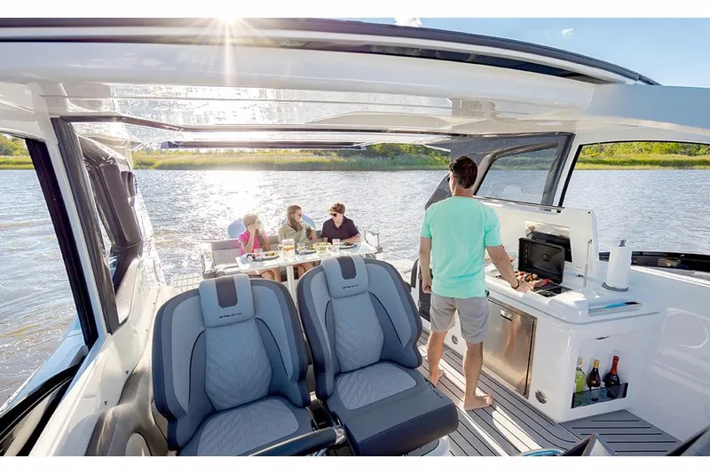 Slide: The Image of Manufacturer Provided Image: 2025 Galeon 375 GTO yacht with people dining and enjoying the sun on deck. - 5